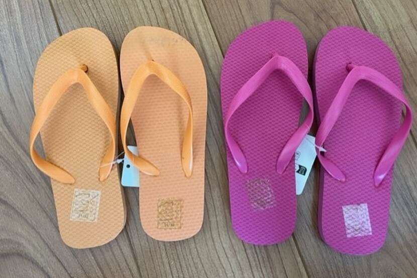 Veiligheidswaarschuwing kinderslippers oranje en roze van Zeeman